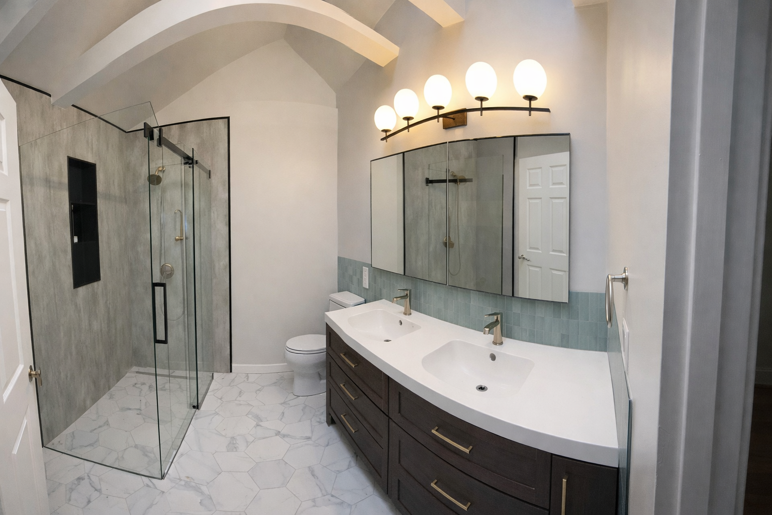Full bathroom remodel with walk-in shower and modern vanity, installed for a homeowner in Renton