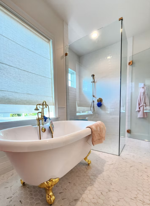 Walk-in shower with glass enclosure and modern tile, installed for a homeowner in Madrona, Seattle
